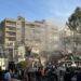 Emergency and security personnel gather at the site of strikes which hit a building adjacent to the Iranian embassy in Syria's cpital Damascus, on April 1, 2024. Israeli strikes hit Syria's capital on April 1, state media reported, as a war monitor said six people were killed in a building adjacent to the Iranian embassy. (Photo by Maher AL MOUNES / AFP)